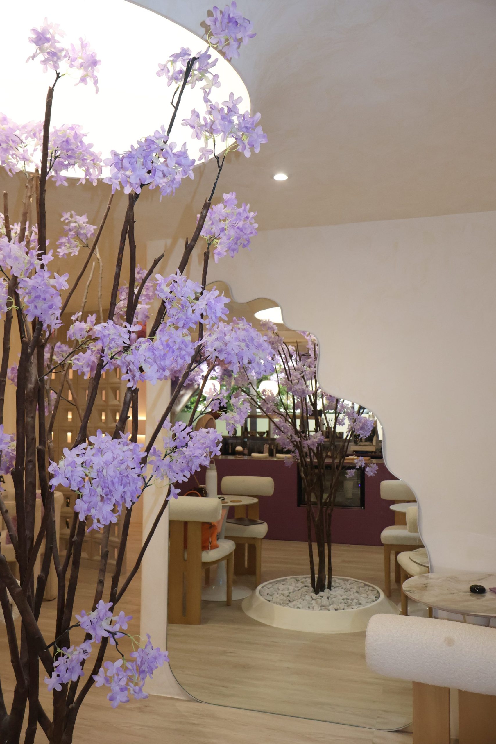 Interior of Lavande in Legaspi Village Makati, wisteria and arched mirror.